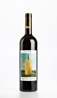 A single bottle of wine on white