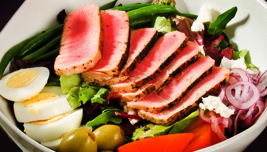 Food photography of Ahi tuna with eggs tomato and peppers by Jeff Behm